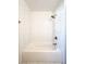 Modern bathroom features a tiled shower with subway tile, rain shower head, and updated fixtures at 110 Randomwood Way, Alpharetta, GA 30022