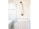 Contemporary shower with glass enclosure, subway tile walls, and a modern showerhead fixture at 110 Randomwood Way, Alpharetta, GA 30022
