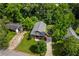 Aerial shot featuring a charming house with a spacious backyard and lush green trees at 1751 Thomasville Se Dr, Atlanta, GA 30315