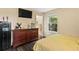 Spacious bedroom featuring wood floors, a picture window, and neutral décor at 1751 Thomasville Se Dr, Atlanta, GA 30315
