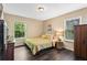 Cozy bedroom with natural light, hardwood floors, and neutral color palette at 1751 Thomasville Se Dr, Atlanta, GA 30315