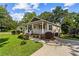 Attractive single-story house with a charming front porch, landscaped yard, and a cozy ambiance at 1751 Thomasville Se Dr, Atlanta, GA 30315