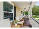 Charming front porch with rocking chairs, creating a relaxing outdoor space at 1751 Thomasville Se Dr, Atlanta, GA 30315
