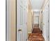 Hallway features gleaming hardwood floors and ample closet space at 1751 Thomasville Se Dr, Atlanta, GA 30315
