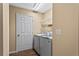 Laundry room featuring new, modern washer and dryer at 1751 Thomasville Se Dr, Atlanta, GA 30315