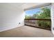 Outdoor balcony with wood railing, perfect for enjoying the greenery and fresh air at 1192 Wylie Se St # 429, Atlanta, GA 30316