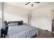 Bedroom with hardwood floors, a ceiling fan, and a comfortable bed at 1192 Wylie Se St # 429, Atlanta, GA 30316