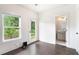 Bedroom featuring hardwood floors, with ensuite bathroom and backyard access at 1192 Wylie Se St # 429, Atlanta, GA 30316