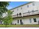 Rear view of a home featuring multiple balconies and well-maintained outdoor space at 1192 Wylie Se St # 429, Atlanta, GA 30316