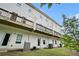 Backyard view with multiple decks and back doors leading to grassy area at 1192 Wylie Se St # 429, Atlanta, GA 30316