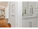 Hallway with marble countertop, cabinet space, and hardwood floors at 156 Lake Forrest Ne Ln, Atlanta, GA 30342