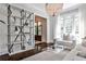 Cozy living room with hardwood floors, open shelving, and stylish decor at 156 Lake Forrest Ne Ln, Atlanta, GA 30342