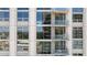 Building exterior featuring balconies with glass railings and views of the surrounding city skyline at 270 17Th Nw St # 2210, Atlanta, GA 30363