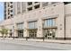 Exterior shot of building with architectural details, large windows, and prominent signage at 270 17Th Nw St # 2210, Atlanta, GA 30363