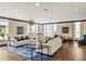 Spacious lounge area with comfortable seating, elegant lighting, and large windows for ample natural light at 270 17Th Nw St # 2210, Atlanta, GA 30363