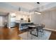 Open-concept living space with modern kitchen, dining area, and hardwood floors at 270 17Th Nw St # 2210, Atlanta, GA 30363