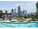 Rooftop pool with sun loungers offering stunning skyline views, ideal for relaxation and recreation at 270 17Th Nw St # 2210, Atlanta, GA 30363