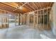 Spacious unfinished basement area with exposed wood framing, perfect for customization at 5765 Riley Rd, Cumming, GA 30028