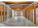 Unfinished basement with exposed ductwork and wooden framing, ready for personalization at 5765 Riley Rd, Cumming, GA 30028