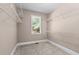Walk-in closet with carpeted floor and shelving units at 5765 Riley Rd, Cumming, GA 30028