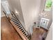 Open foyer with staircase, chandelier, and french doors at 5765 Riley Rd, Cumming, GA 30028