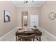 Office with neutral paint, tray ceiling, and a dark desk at 5765 Riley Rd, Cumming, GA 30028