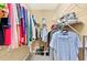 Walk-in closet with shelving and clothing racks for optimal storage at 935 Santa Anita Dr, Woodstock, GA 30189