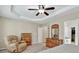 Bright main bedroom features neutral paint, carpeting, and furniture at 935 Santa Anita Dr, Woodstock, GA 30189