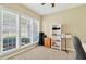 Bright room features large windows, neutral carpet, and functional storage space at 935 Santa Anita Dr, Woodstock, GA 30189