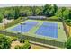Well-maintained tennis courts provide an excellent recreational amenity, promoting active lifestyles and community engagement at 935 Santa Anita Dr, Woodstock, GA 30189