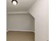 Clean and ready basement space featuring tiled flooring and neutral paint at 2480 Miriam Ln, Decatur, GA 30032