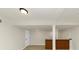 Unfinished basement space with exposed beams and brick bar area awaiting your creativity at 2480 Miriam Ln, Decatur, GA 30032