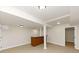 Finished basement with tile floors, bar, and neutral colored walls at 2480 Miriam Ln, Decatur, GA 30032