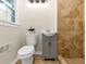 Modern half-bathroom featuring a vanity cabinet with a sink and a toilet at 2480 Miriam Ln, Decatur, GA 30032