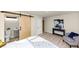 Bedroom features a modern sliding barn door leading to ensuite bathroom at 2480 Miriam Ln, Decatur, GA 30032
