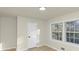 Bright bedroom featuring hardwood flooring and windows offering plenty of natural light at 2480 Miriam Ln, Decatur, GA 30032