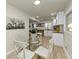 Eat-in kitchen and dining area with modern and natural light at 2480 Miriam Ln, Decatur, GA 30032