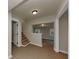 Inviting hallway with tile floors, leading to a staircase and other rooms, offering easy access to different areas at 2480 Miriam Ln, Decatur, GA 30032