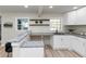 Remodeled kitchen with open layout and views of the backyard at 2480 Miriam Ln, Decatur, GA 30032