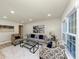 Bright living room with hardwood floors and neutral decor at 2480 Miriam Ln, Decatur, GA 30032