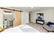 Bedroom featuring a barn door leading to a bathroom and modern interior design at 2480 Miriam Ln, Decatur, GA 30032