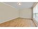 Bright bedroom featuring neutral walls and modern vinyl flooring at 4639 Tell Sw Rd, Atlanta, GA 30331