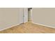 This cozy bedroom has wood-look floors, light walls, and a closet at 4639 Tell Sw Rd, Atlanta, GA 30331
