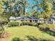 Charming single-story home with a brick facade and lush landscaping at 4639 Tell Sw Rd, Atlanta, GA 30331