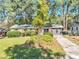 Charming single-story home with a brick facade and lush landscaping at 4639 Tell Sw Rd, Atlanta, GA 30331