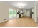 Open kitchen with stainless steel appliances and light colored cabinetry at 4639 Tell Sw Rd, Atlanta, GA 30331