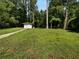 The property boasts a spacious backyard, perfect for outdoor activities and gatherings at 6389 Cumberland Dr, Rex, GA 30273