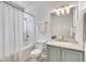Clean bathroom with a tub, shower, and modern fixtures at 800 Peachtree Ne St # 101, Atlanta, GA 30308