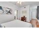Bright bedroom with ceiling fan, desk area, and an ensuite bath at 800 Peachtree Ne St # 101, Atlanta, GA 30308