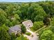 Beautiful aerial view of the home surrounded by lush trees, highlighting the serene neighborhood setting at 1327 Harvard Ne Rd, Atlanta, GA 30306